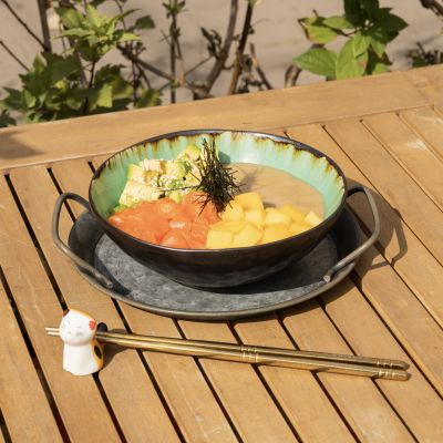 Poke bowl with salmon, avocado, mango
